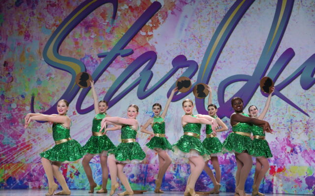 Elite Dance Company Dancers in green costumes