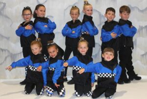 Mid American Hip hop students in black and blue class costume.